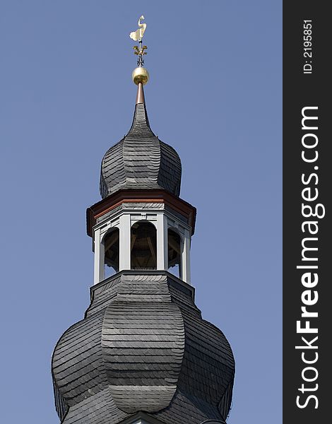 Church spire with blue sky as background