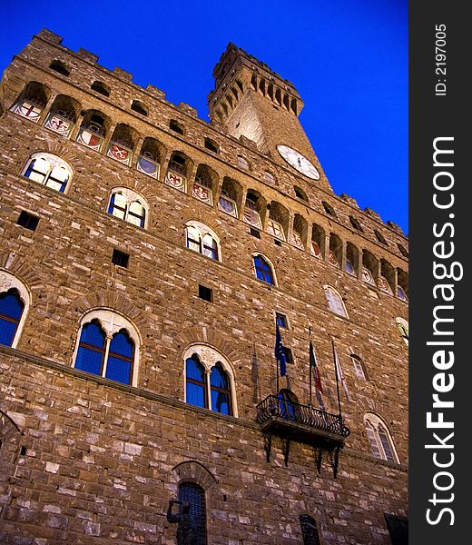 Majestic Florence architecture at night with clocktower. Majestic Florence architecture at night with clocktower