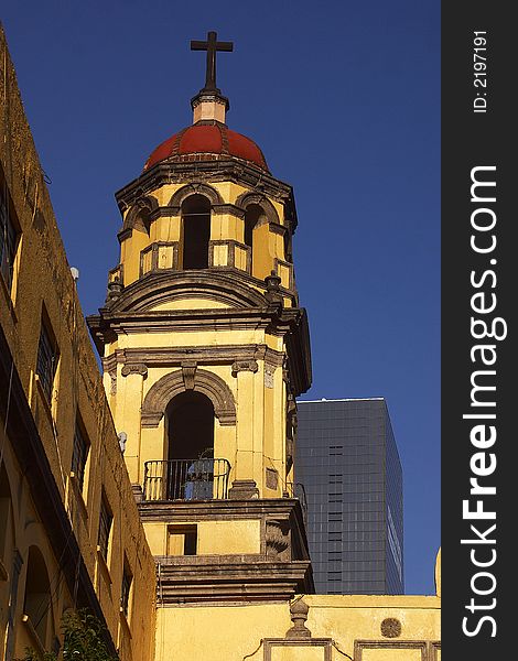 Partial view of the tower of a colonial building, the Viceroyal painting gallery down town Mexico city, Mexico, Latin America. Partial view of the tower of a colonial building, the Viceroyal painting gallery down town Mexico city, Mexico, Latin America