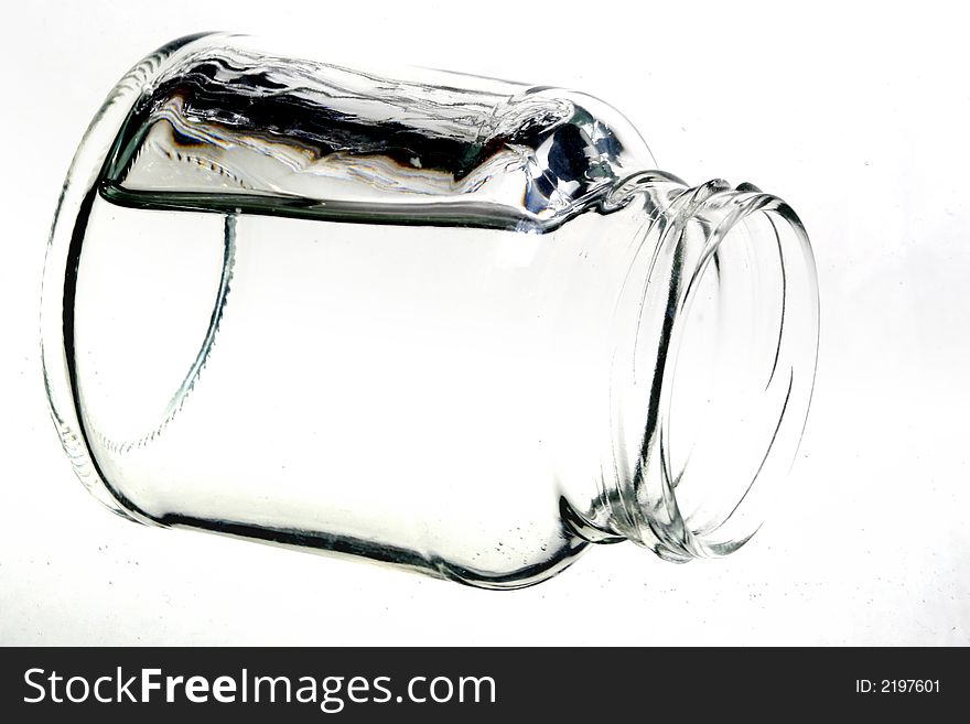 A liquid and glass jar with water