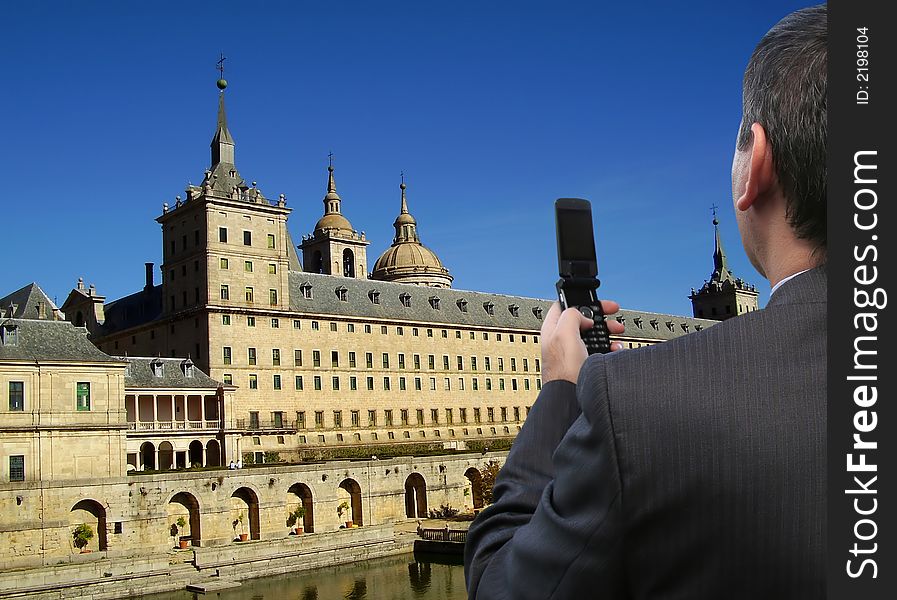 Salesman calling his friends from Spain