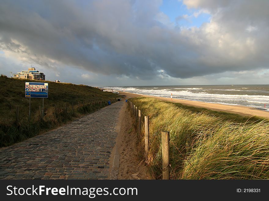 Path across the dunes to the beach. Path across the dunes to the beach