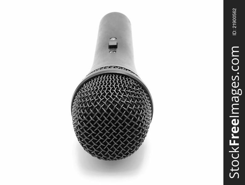 Black microphone on white background