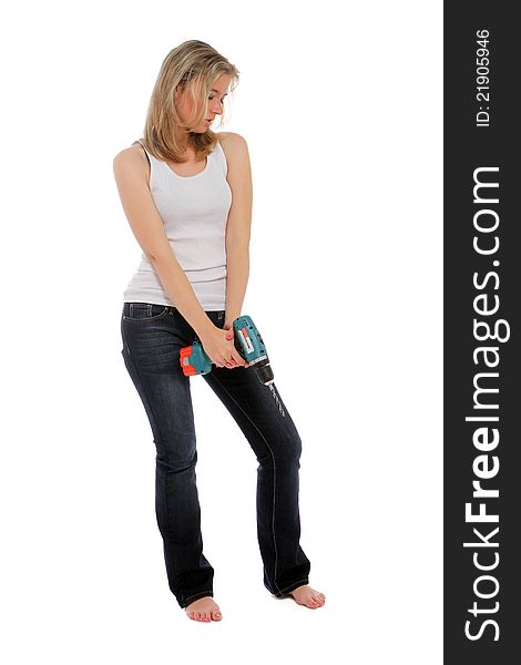 Young woman holding up a cordless drill. Young woman holding up a cordless drill