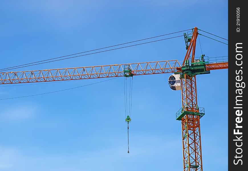 Just crane and blue sky on a background