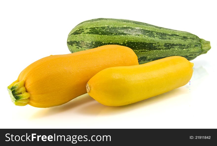 Yellow and Green zucchini on a white background. Yellow and Green zucchini on a white background