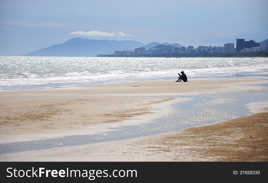 Fisherman on shore fishing coast fisher blue sky sit on shore