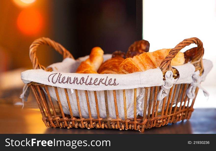 Basket with croissants for breakfast