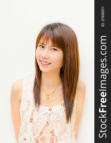 Asian cute girl smiling on white background