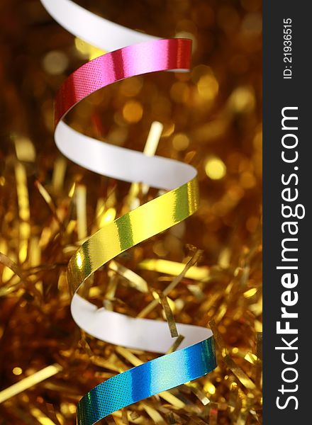 Christmas ribbon on a golden background