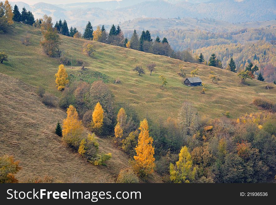 Mountain landscape with  wooden house