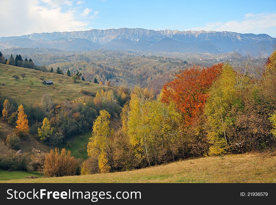 Rural accommodation: hill landscape with private property near the forest in autumn time. Rural accommodation: hill landscape with private property near the forest in autumn time
