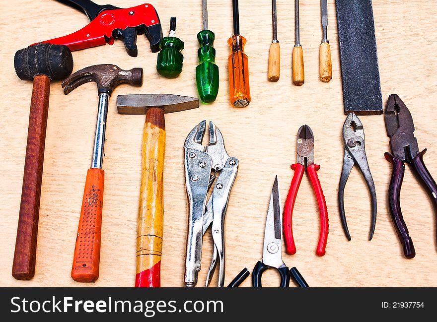 Tools crafts. Put together on a wooden floor. Tools crafts. Put together on a wooden floor.