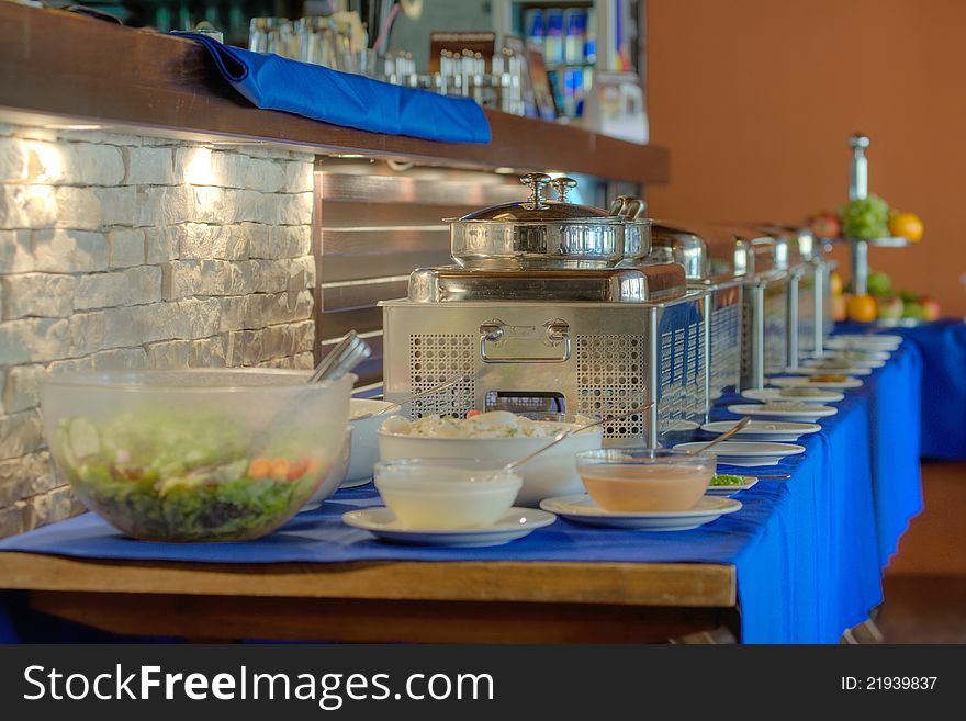 Banquet meals and Metallic banquet meal trays served on tables. Banquet meals and Metallic banquet meal trays served on tables