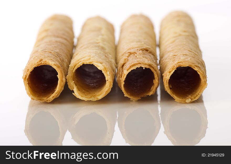 Egg rolls is snack that good to eat. SHot on white background