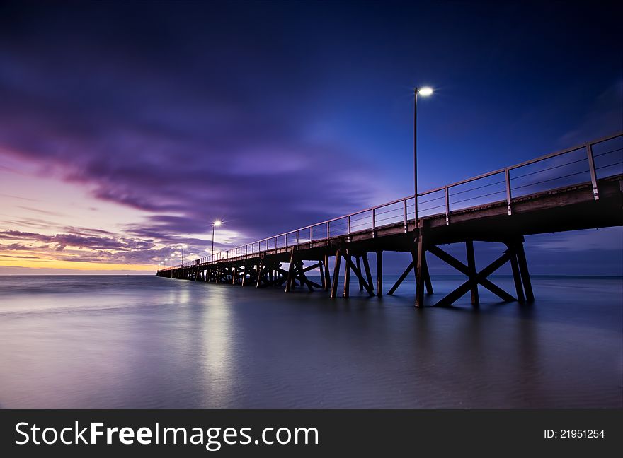 Sun sets over a jetty in South Australia. Sun sets over a jetty in South Australia