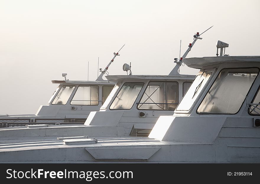 Boats on river in fog