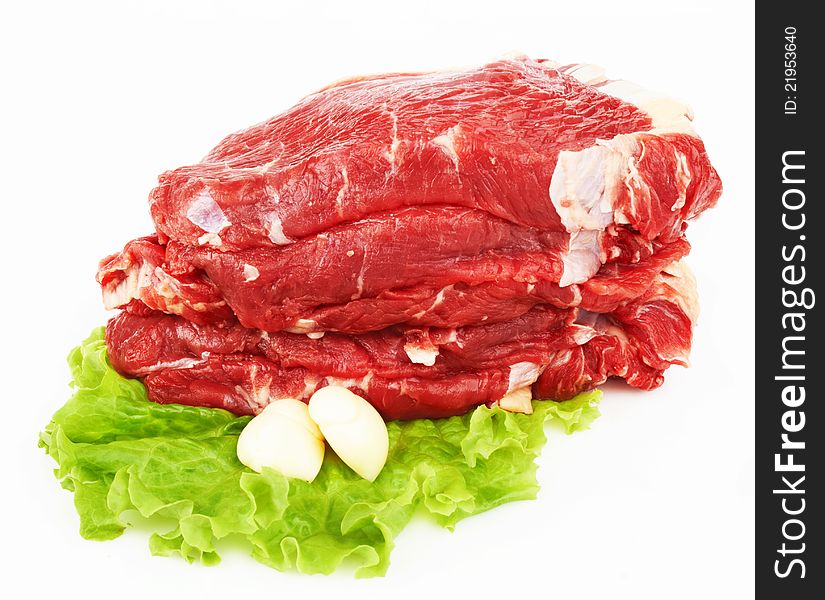 The pieces of raw fillet steaks on white background.