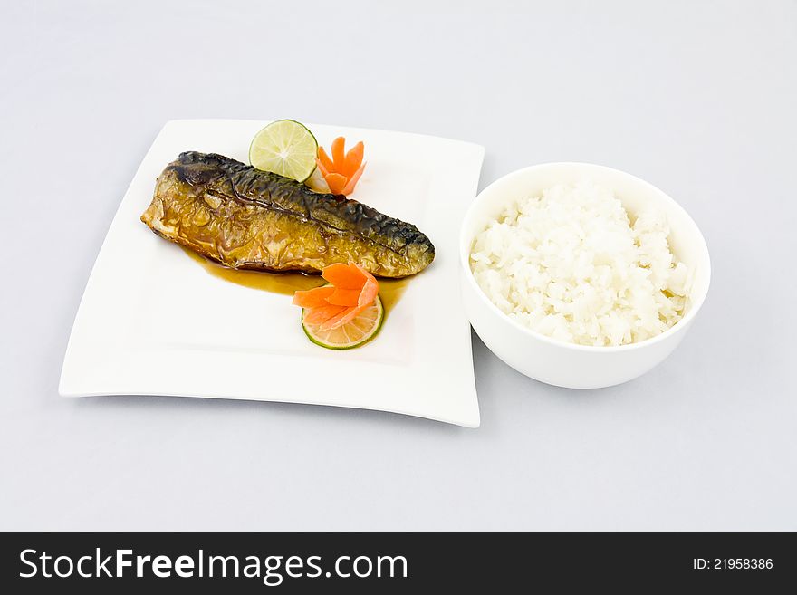 Saba, Mackerel grilled fish and a bowl of rice. Saba, Mackerel grilled fish and a bowl of rice.