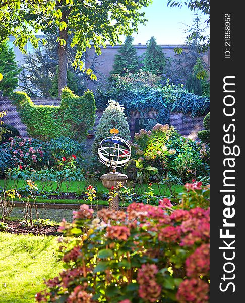 Classic home garden in dutch style by season. Classic home garden in dutch style by season