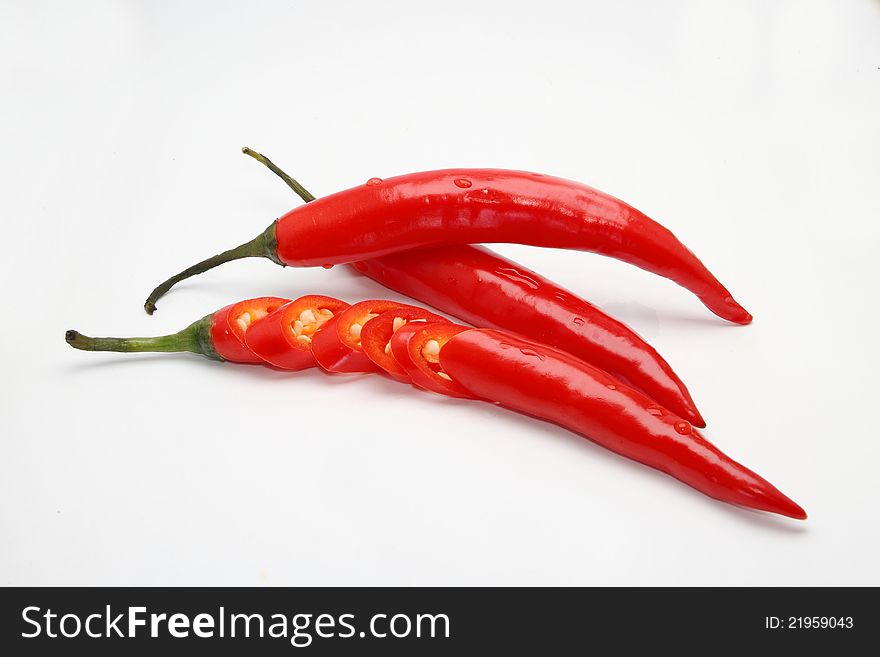 Red fresh chili pepper isolated on white background