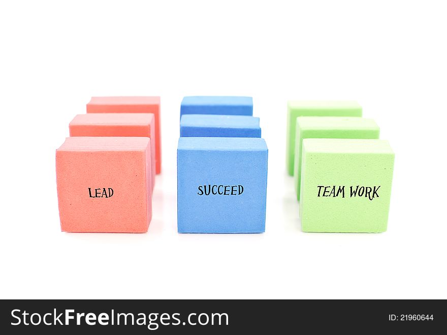 Lead, Succeed And Team Work Written On Colorful Lines Of Blocks. Lead, Succeed And Team Work Written On Colorful Lines Of Blocks