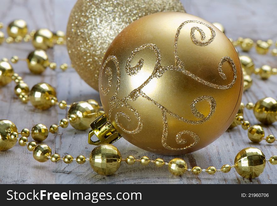 Two Christmas golden balls. Close-up. Two Christmas golden balls. Close-up.