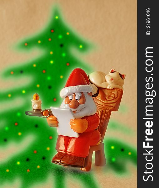 Santa claus reading letter with christmas tree background. Santa claus reading letter with christmas tree background