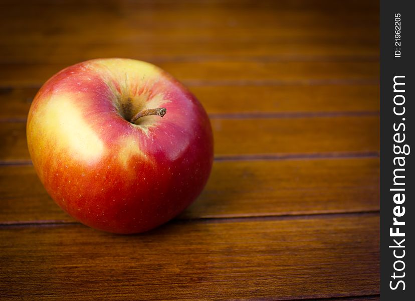Fresh, ripe apple on table. Fresh, ripe apple on table