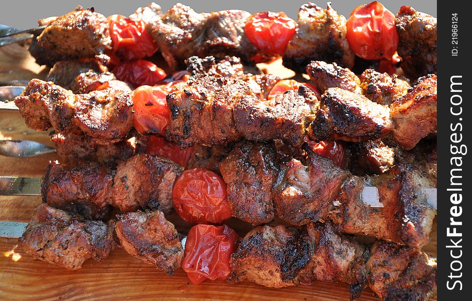 Pork shashlik with small tomatoes