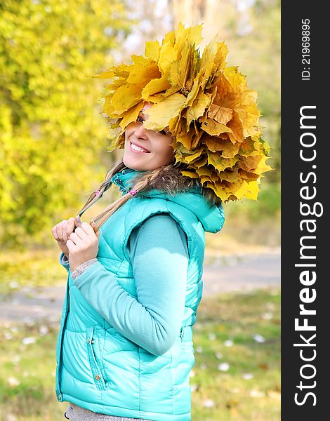 Beautiful woman wearing a crown of leaves. Beautiful woman wearing a crown of leaves
