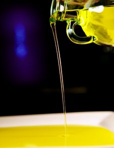 Olive Oil Glass Bottle Poring Oil Stock Photography