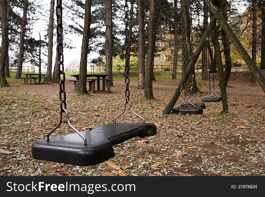 The swings abandoned in the winter