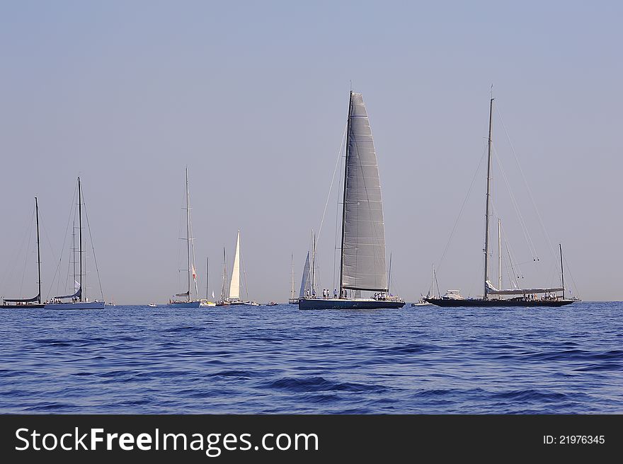 Sailboats waiting for starting regatta