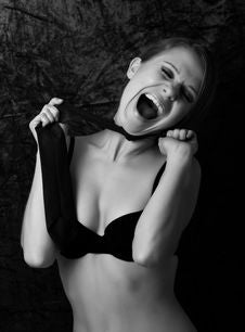 Wild Girl In A Bra Shouting Royalty Free Stock Images
