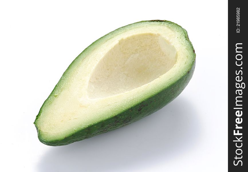 Avocado half on white background