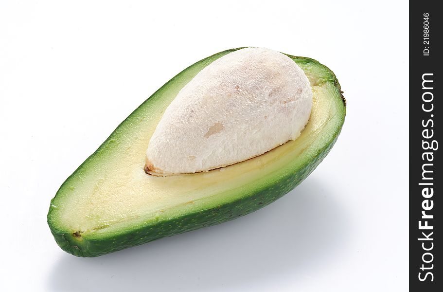 Avocado half on white background