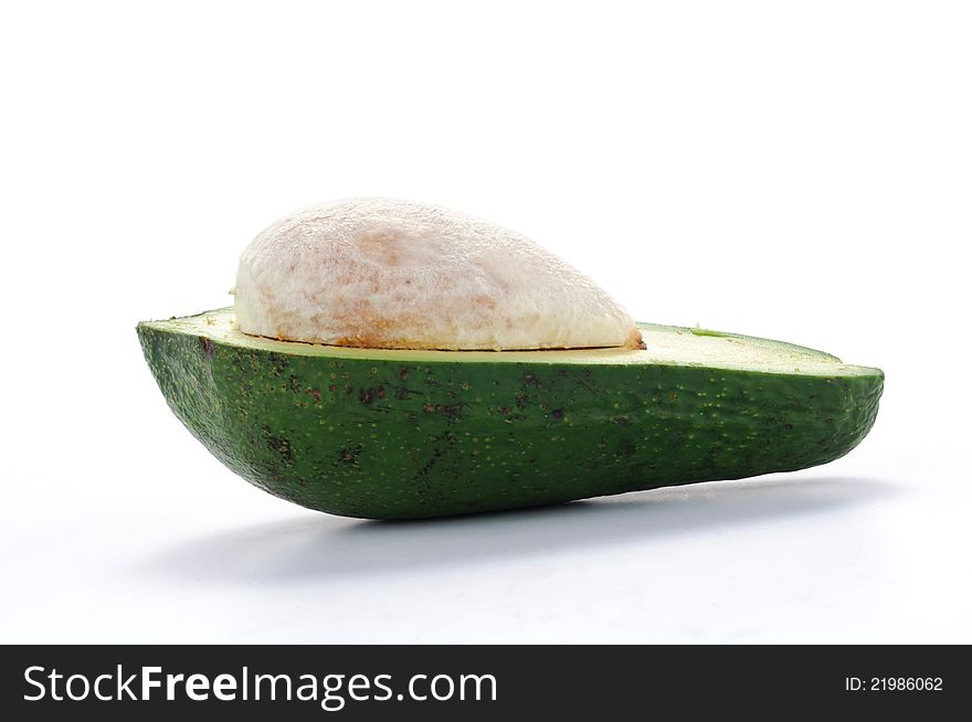 Avocado half on white background