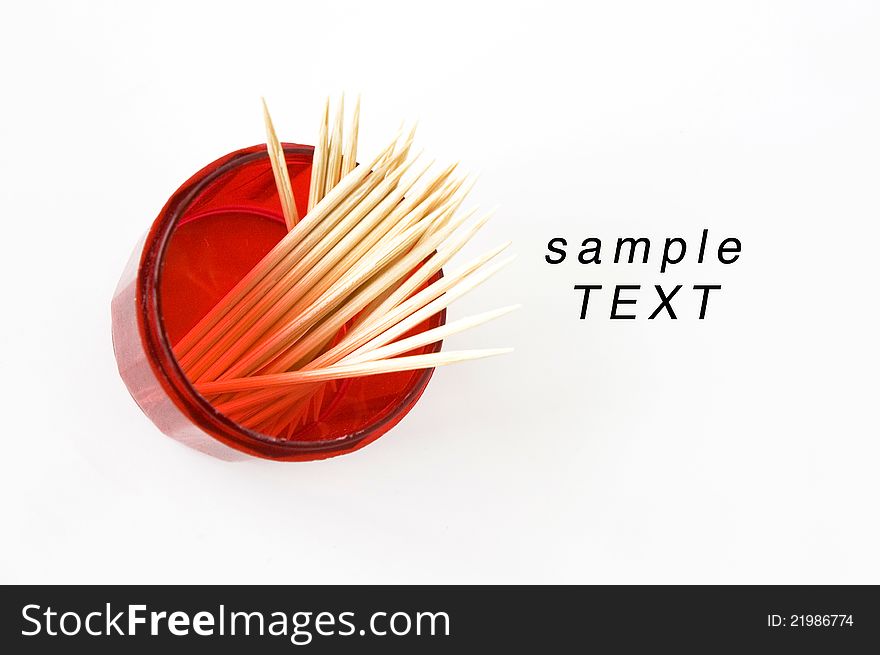 Tooth pick in red box isolated photo