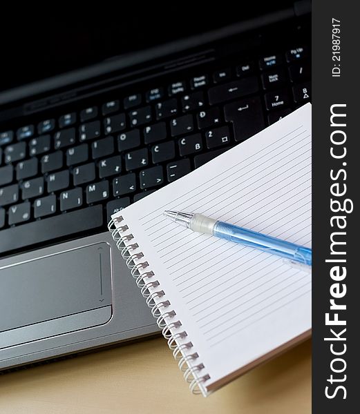 Business note book on laptop, business strategy concept