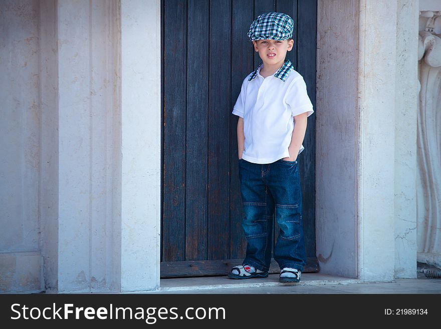 Little stylish boy in Rome town