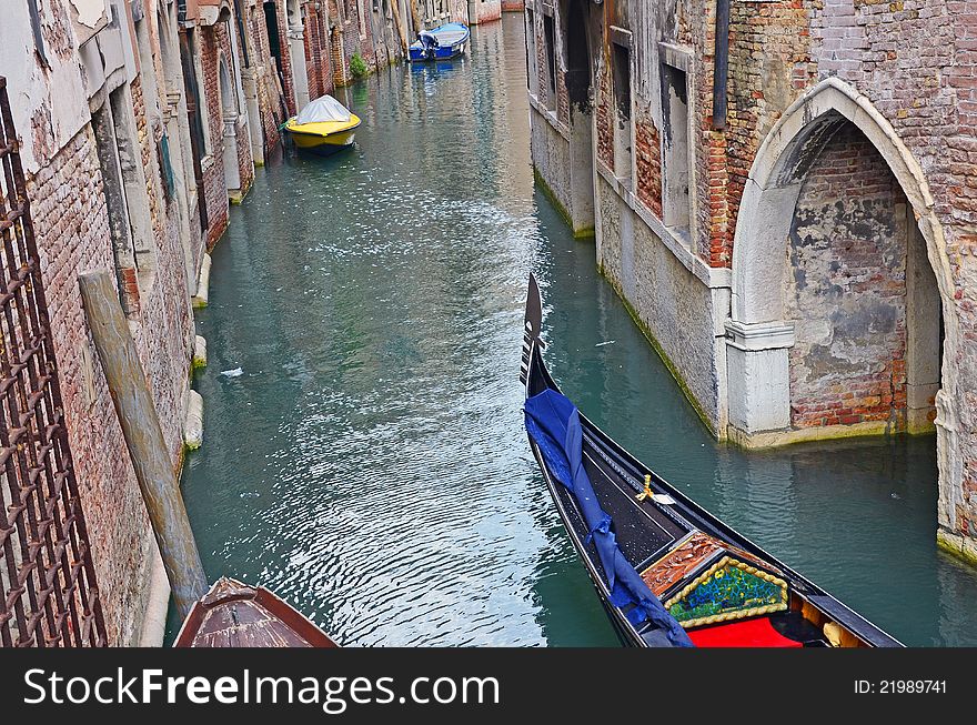 Gondola and boat on venice narrow channel. Gondola and boat on venice narrow channel