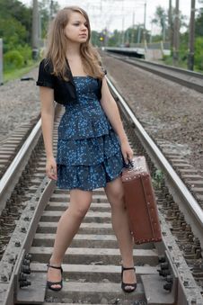Girl With A Suitcase Standing On The Rails Stock Image Girl With A Suitcase Standing On The Rails Stock Image