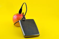 Hard Disk, Cable, And An Apple Royalty Free Stock Image Hard Disk, Cable, And An Apple Royalty Free Stock Image
