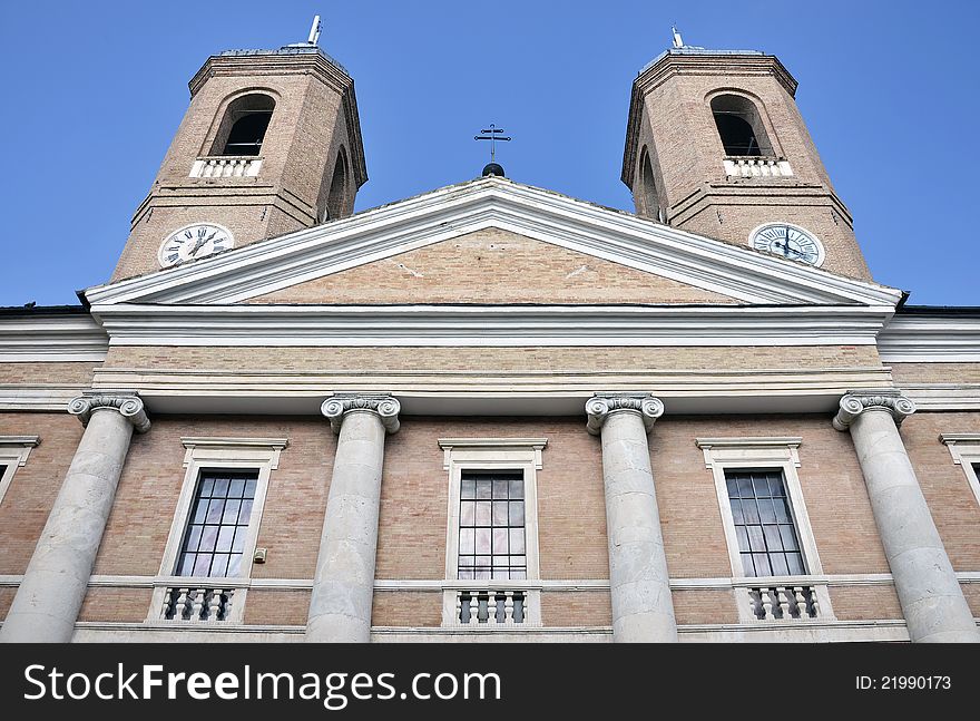 Tower with clock and cross in Camerino city at 200 km north far from Rome. Tower with clock and cross in Camerino city at 200 km north far from Rome