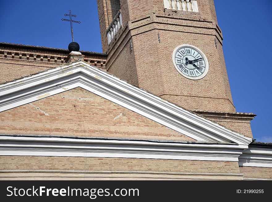 Tower with clock and cross in Camerino city at 200 km north far from Rome. Tower with clock and cross in Camerino city at 200 km north far from Rome