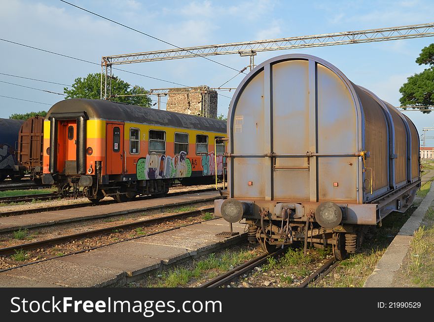 Old industrial vagon on railroad in front of the fortres. Old industrial vagon on railroad in front of the fortres