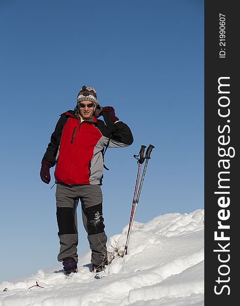 Young Man Preparing For Ski