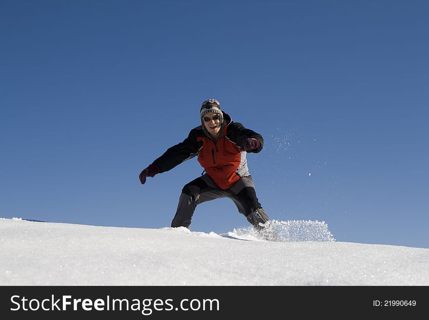 Young man having fun in snow. Young man having fun in snow
