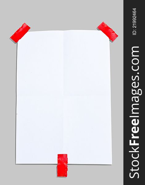 Note paper and 3 red tapes on white background